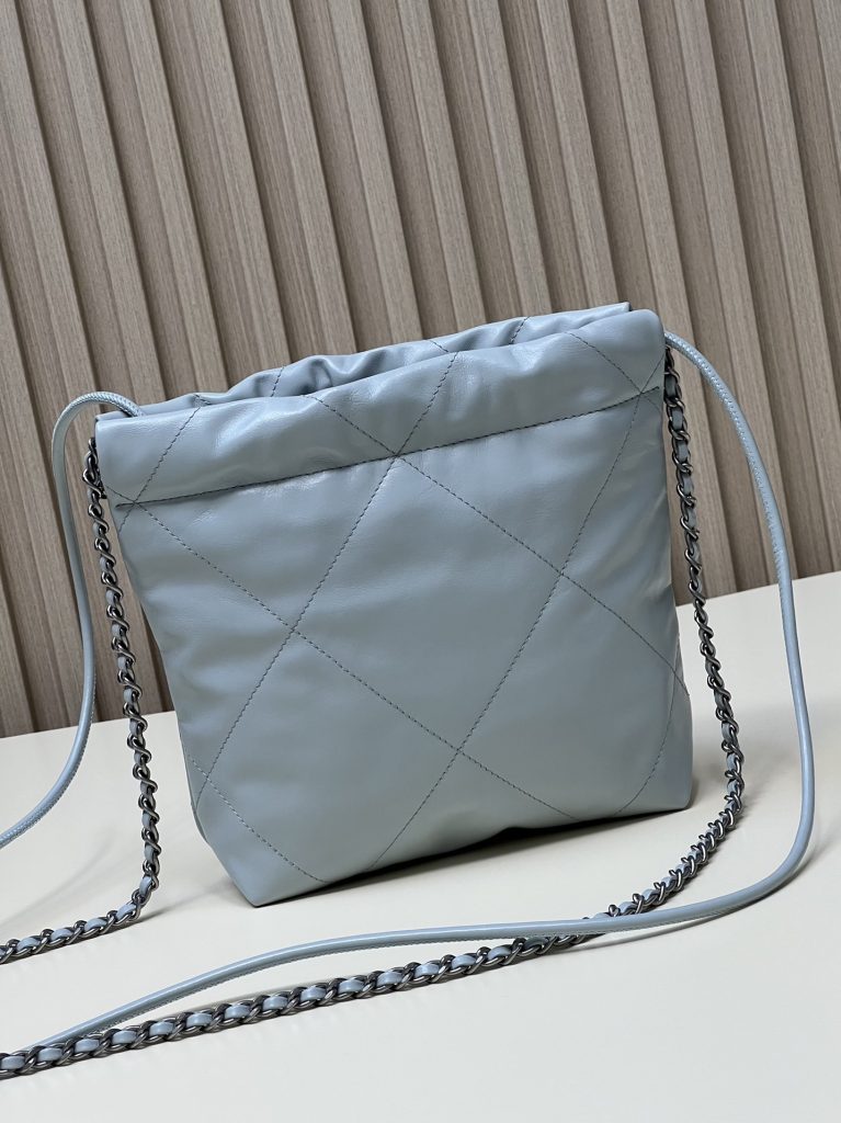 CHANEL Chanel 22Bag 23A drawstring closure chain shiny calfskin bucket bag shoulder crossbody bag mini female models milk blue baby blue