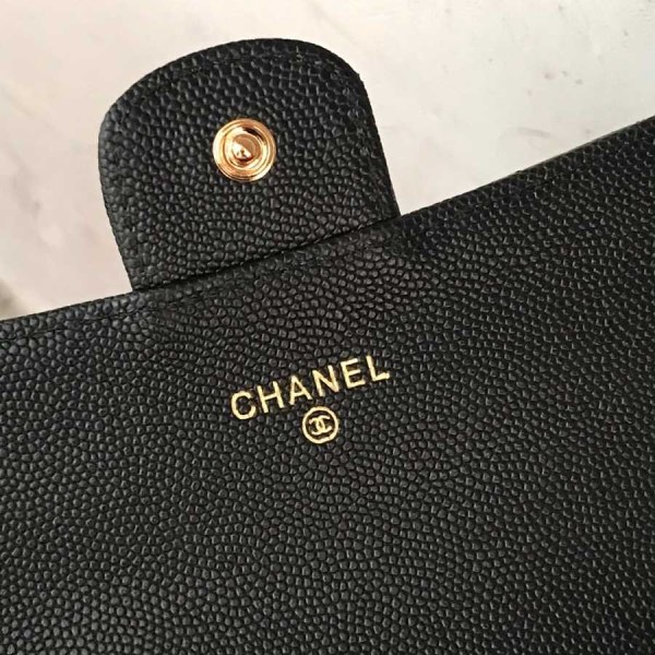 Chanel black chevron caviar gold hardware wallet