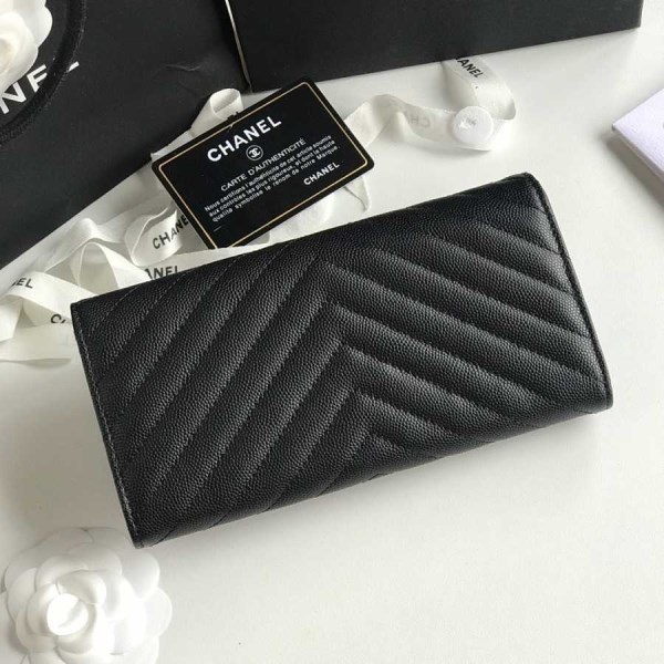 Chanel black chevron caviar gold hardware wallet